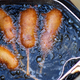 Image for article titled I crammed the entire state of Wisconsin into a corn dog